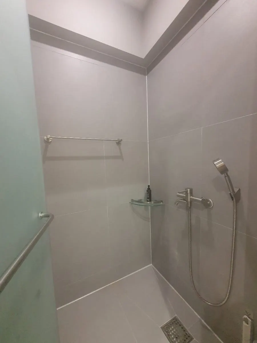 Interior of the waxing room and shower area