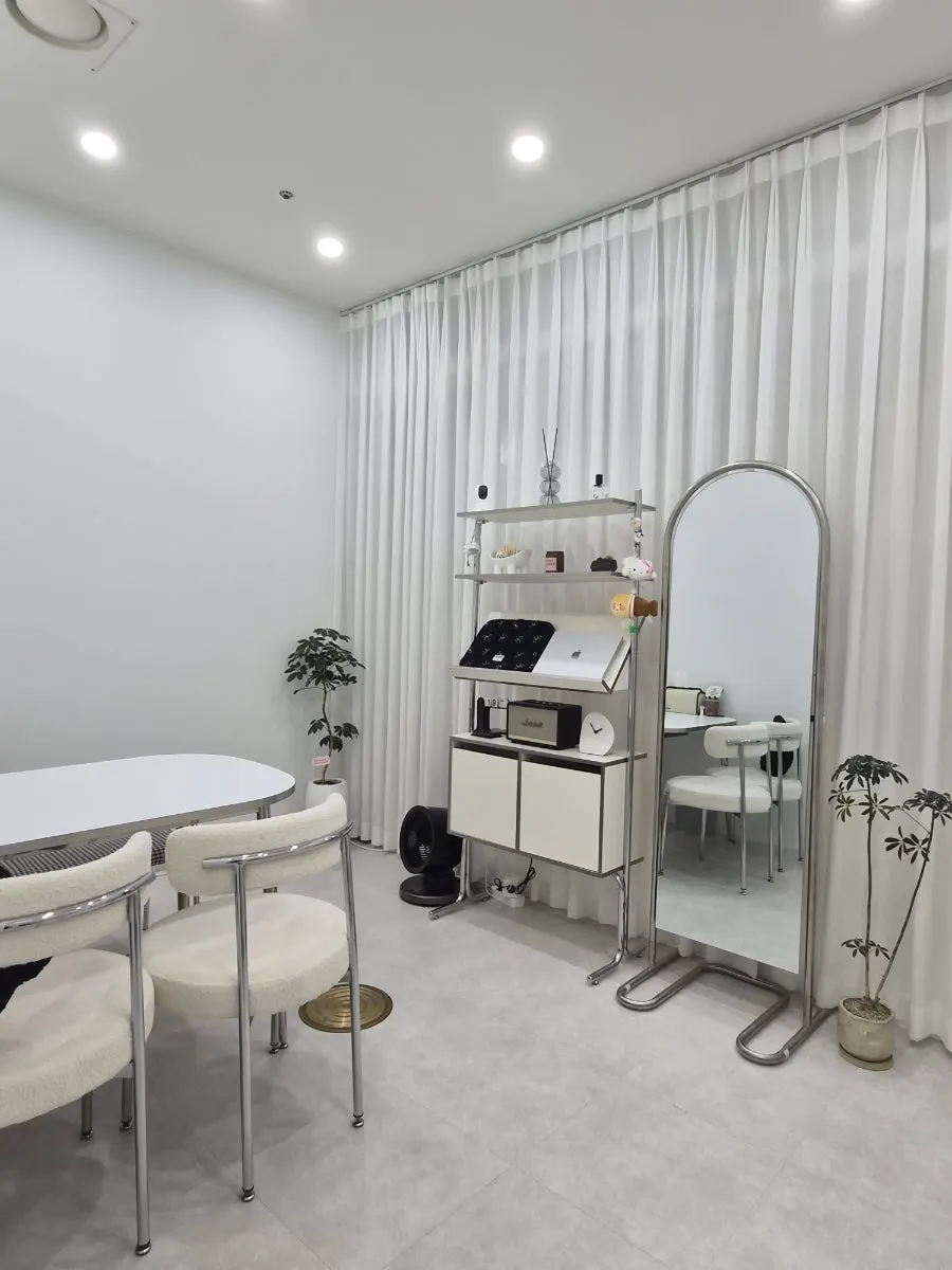 Interior of Iyo Shop decorated in white and silver tones