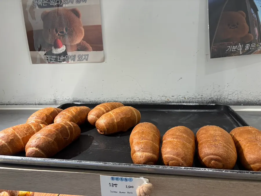 Display case with several types of madeleines and financiers