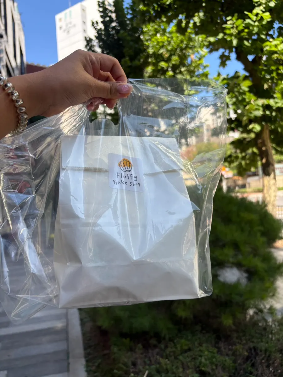 Five madeleine flavors and a financier packed to take home