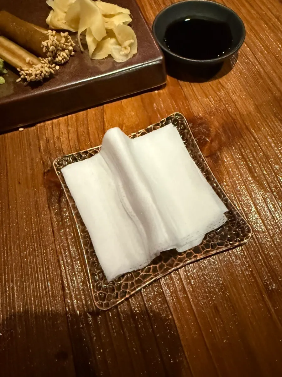 Wet towel folded into a finger shape