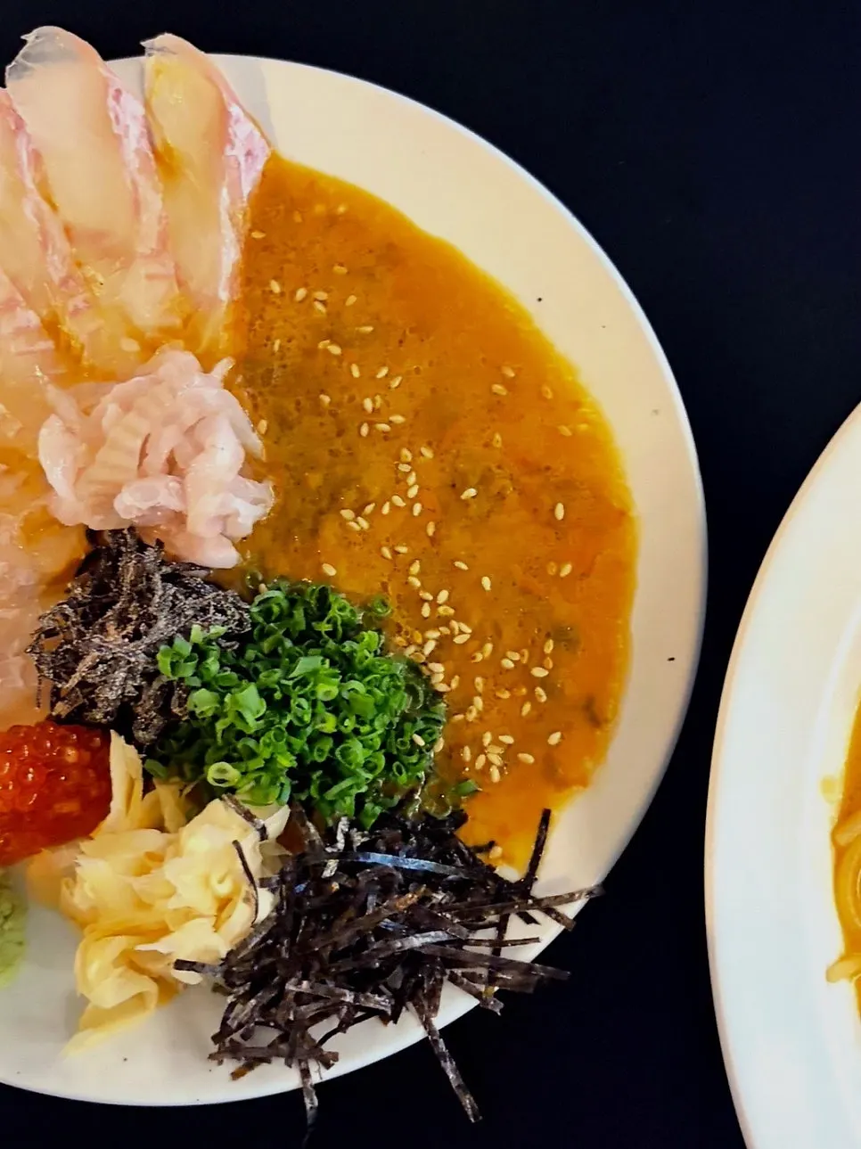 Flatfish sashimi with geu sauce and toppings