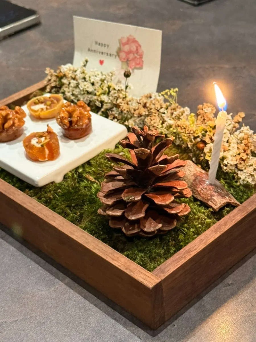 Anniversary tea table with candied walnuts and persimmon rolls