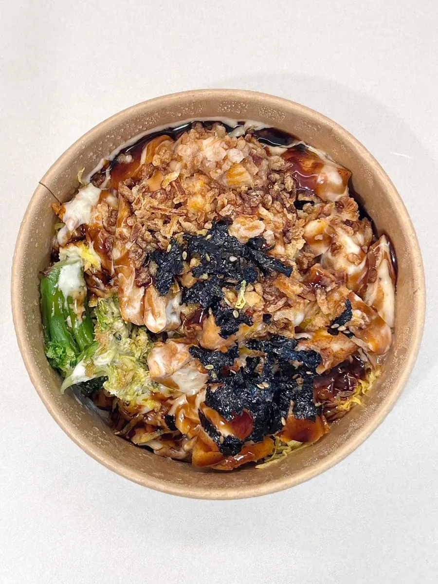 Chicken protein rice bowl and protein box brought home as takeout