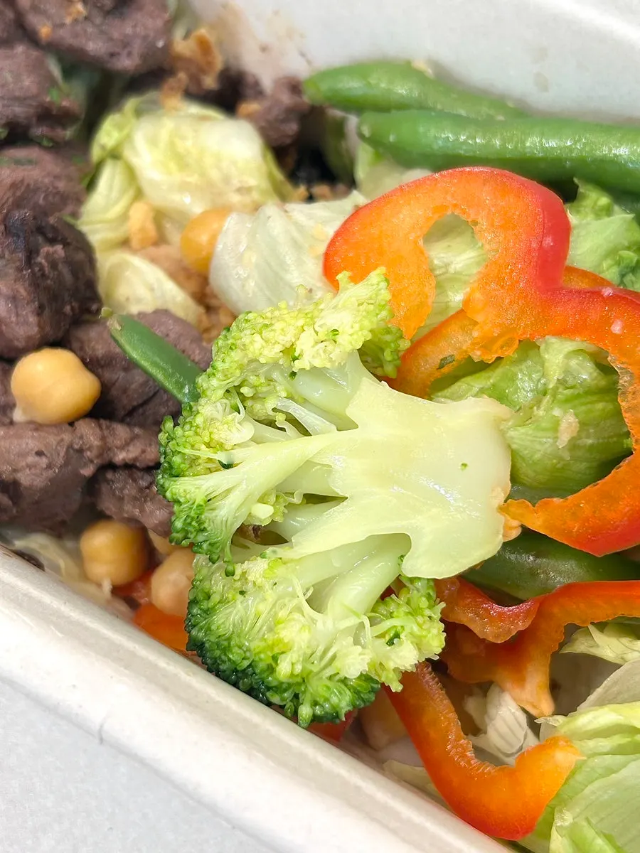Salad box with lettuce and bell peppers