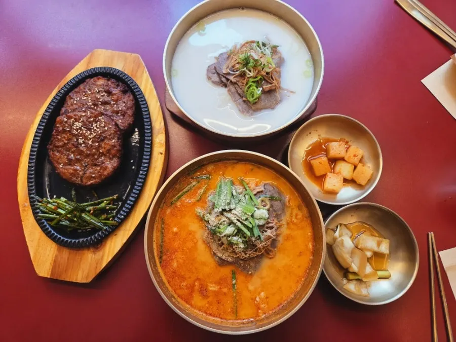 Gukbap served in a brass bowl