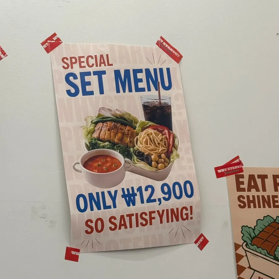 Menu board featuring chicken gomtang and protein rice bowl
