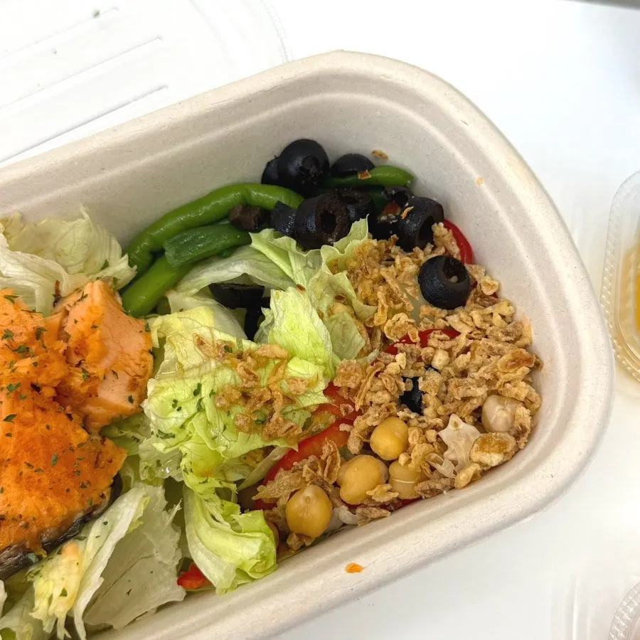 Close-up of salmon and vegetable toppings