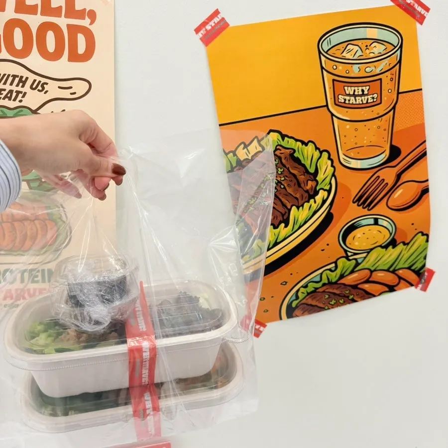 Carefully packed protein box takeout bags