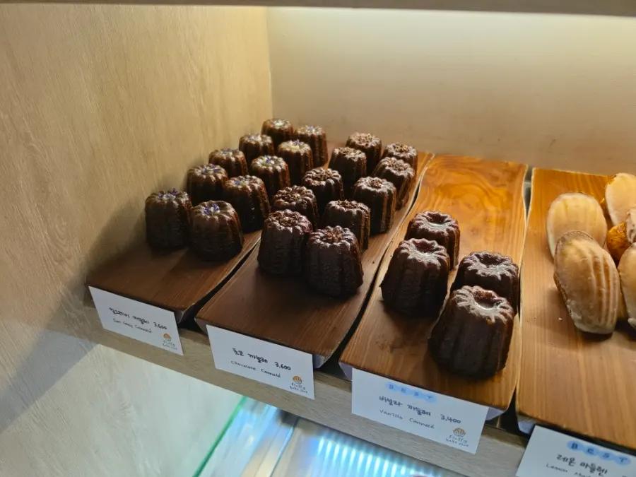 Three kinds of canelé: earl grey, chocolate, and vanilla