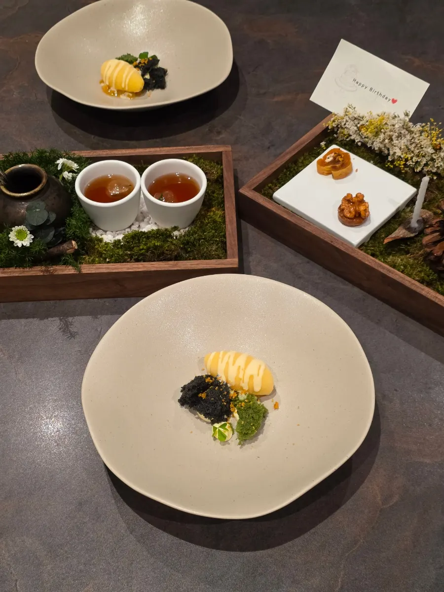 Corn ice cream dessert with green tangerine cream sauce