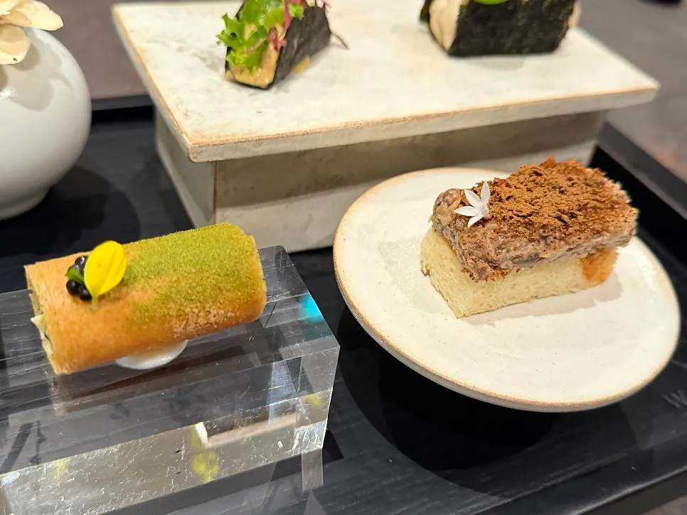 The four bite-sized dishes arranged together
