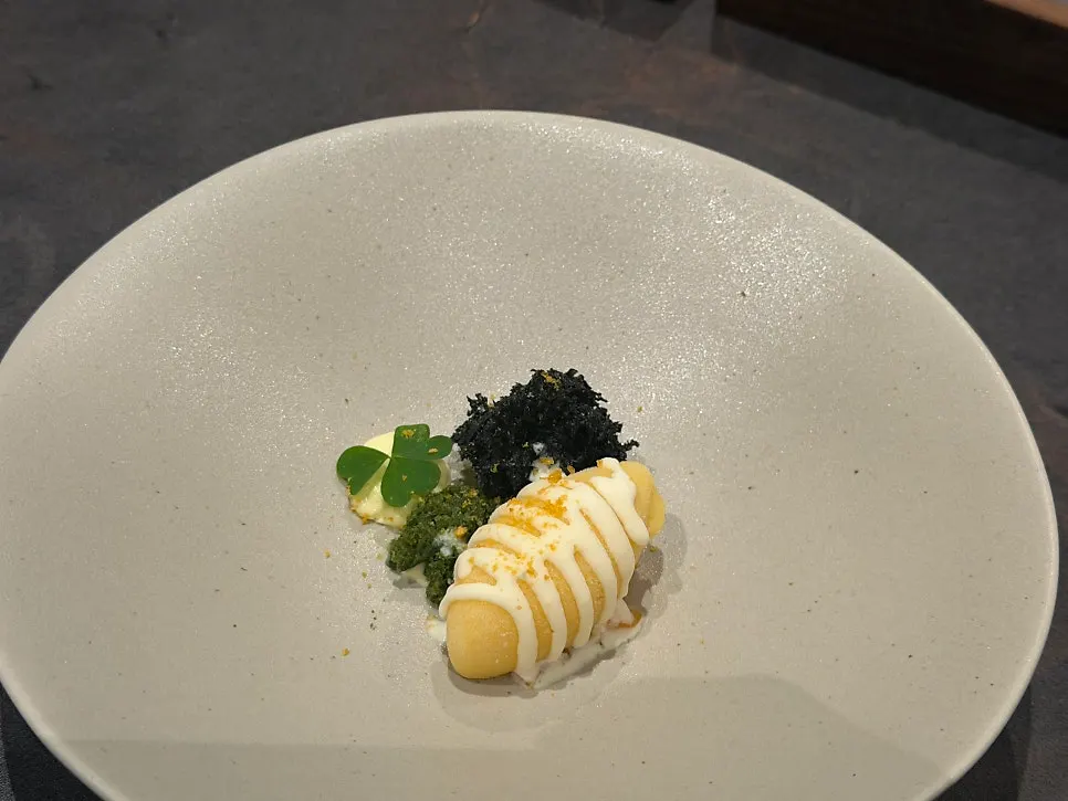 Corn ice cream dessert with green tangerine cream sauce