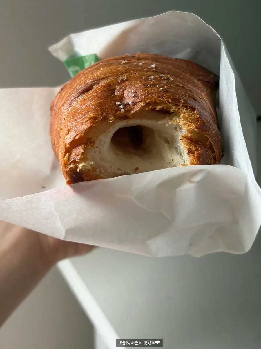 Cross-section of salt bread showing its butter pocket