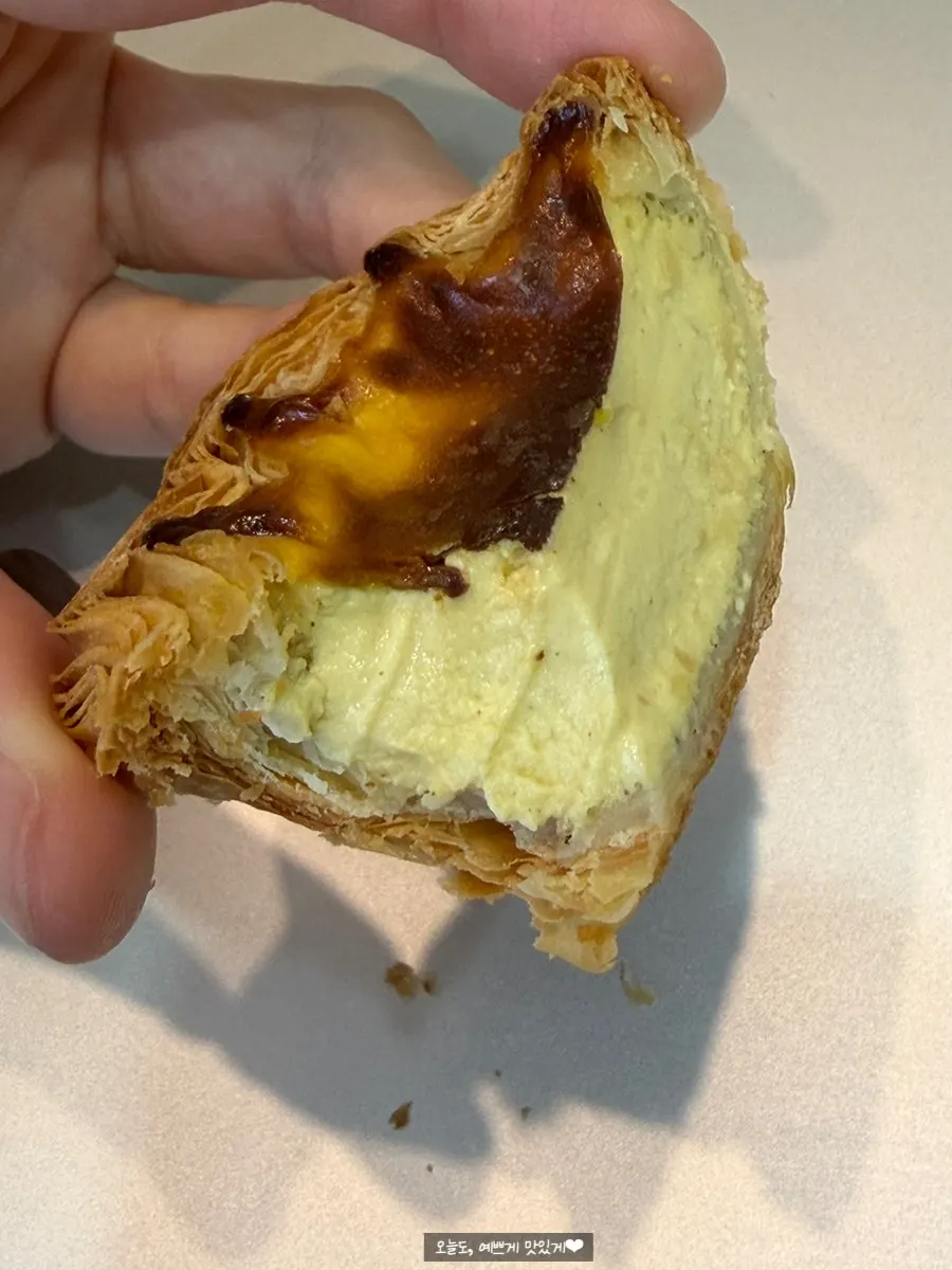 Cross-section of egg tart showing its soft filling