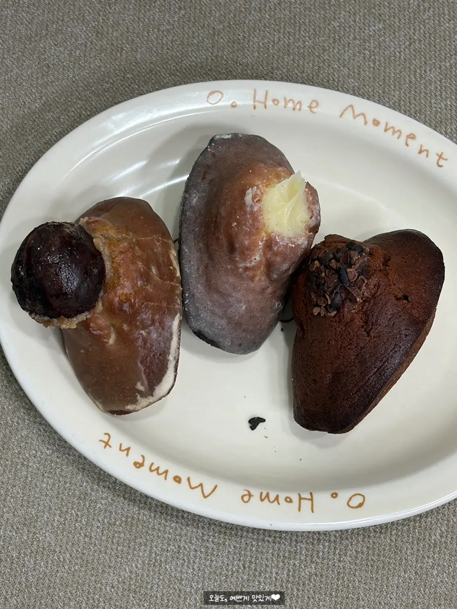 Four madeleine flavors arranged on a plate