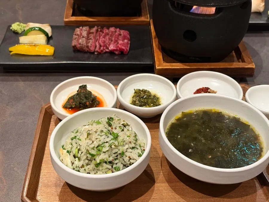Seasonal fish pot rice portioned into individual bowls