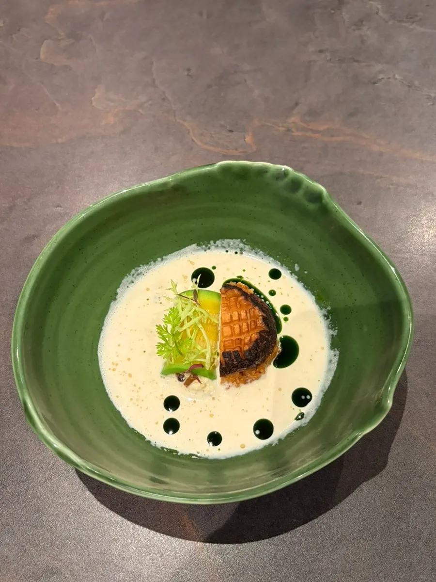 A lobster taco topped with sous-vide lobster