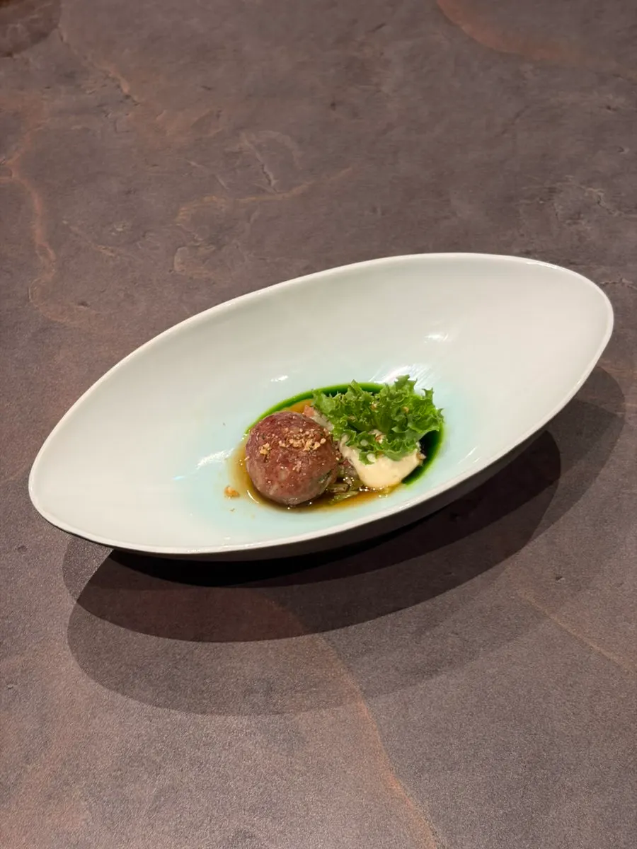 Jeju tilefish dish finished with poured neungi mushroom broth