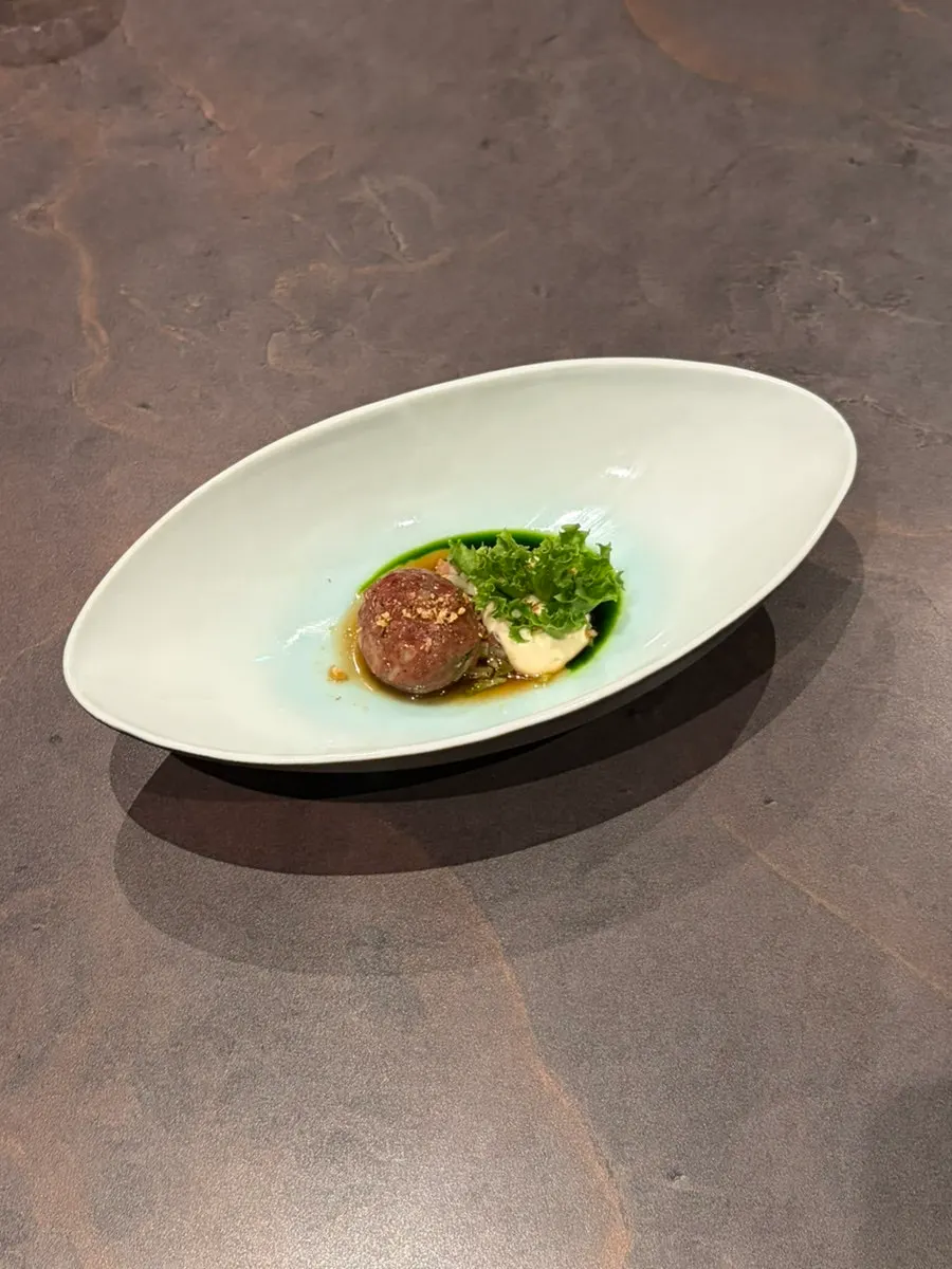 Tilefish served over barley and chamnamul rice with mullet roe