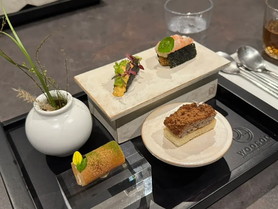 Plating of the four bite-sized dishes