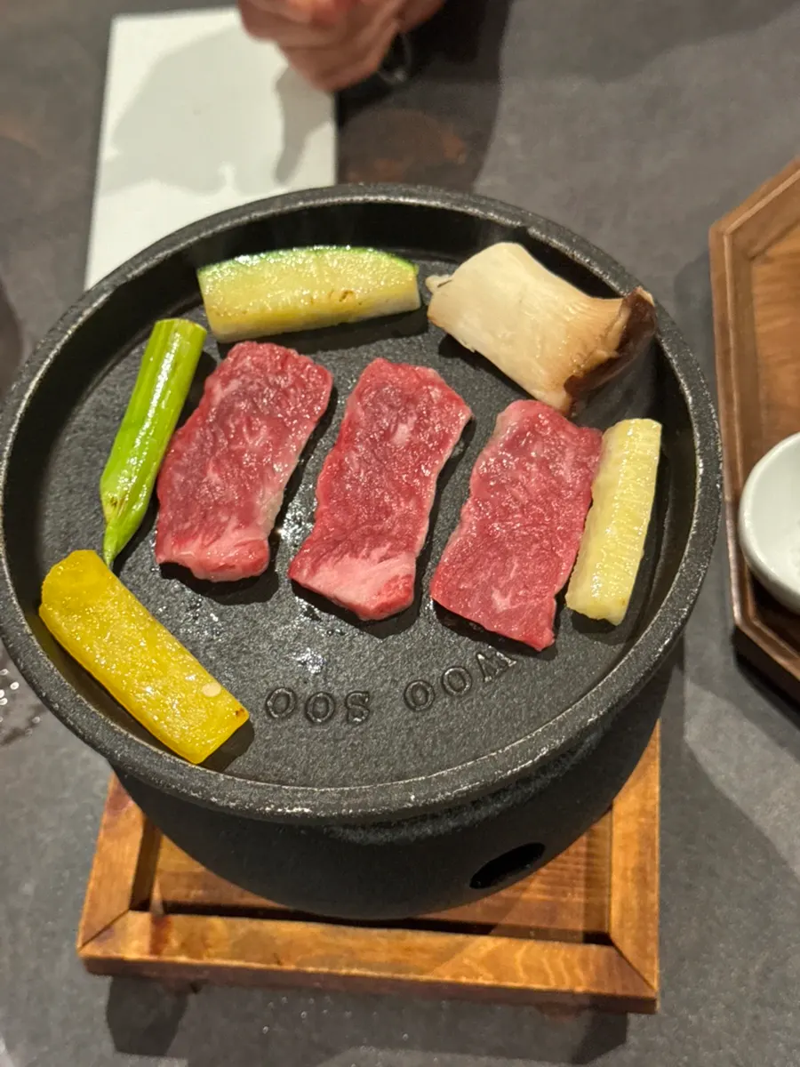 Hanwoo grilling on a personal tabletop grill