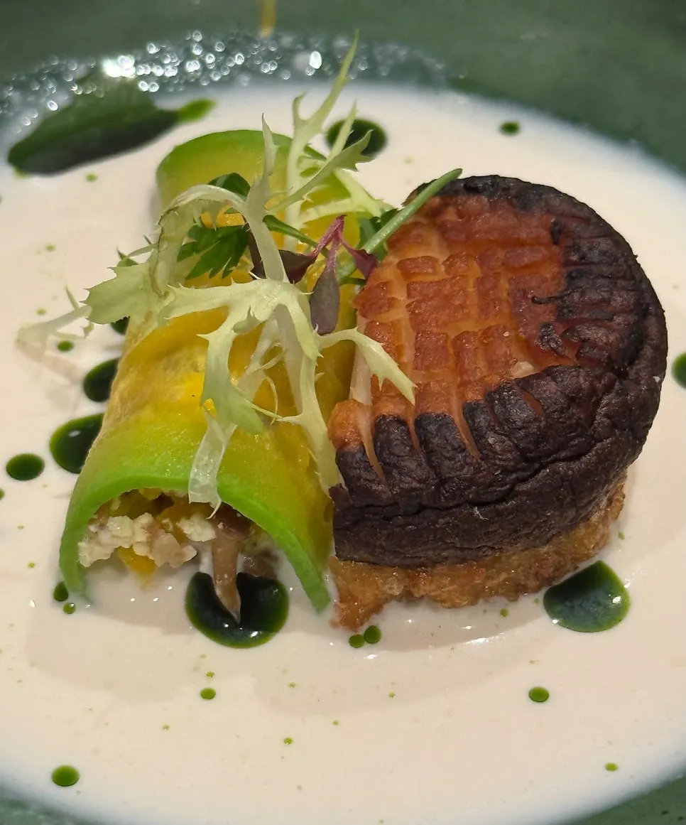 Grilled shiitake mushroom scored in a criss-cross pattern