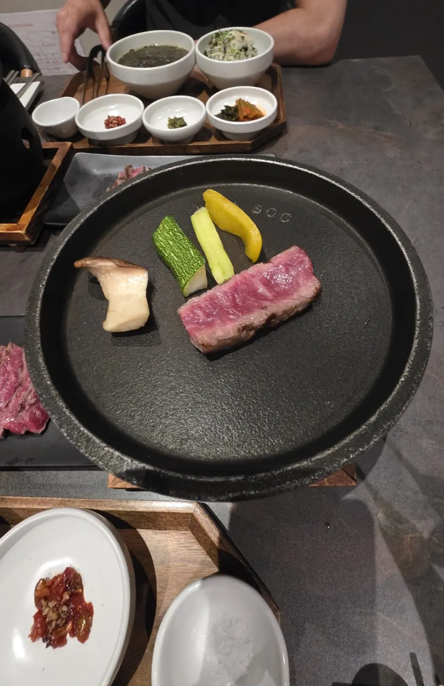 1++ grade hanwoo sirloin grilling on an individual brazier