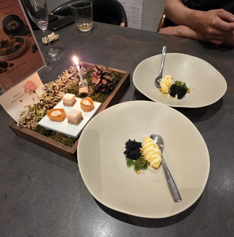 Final dessert of the course along with anniversary snacks