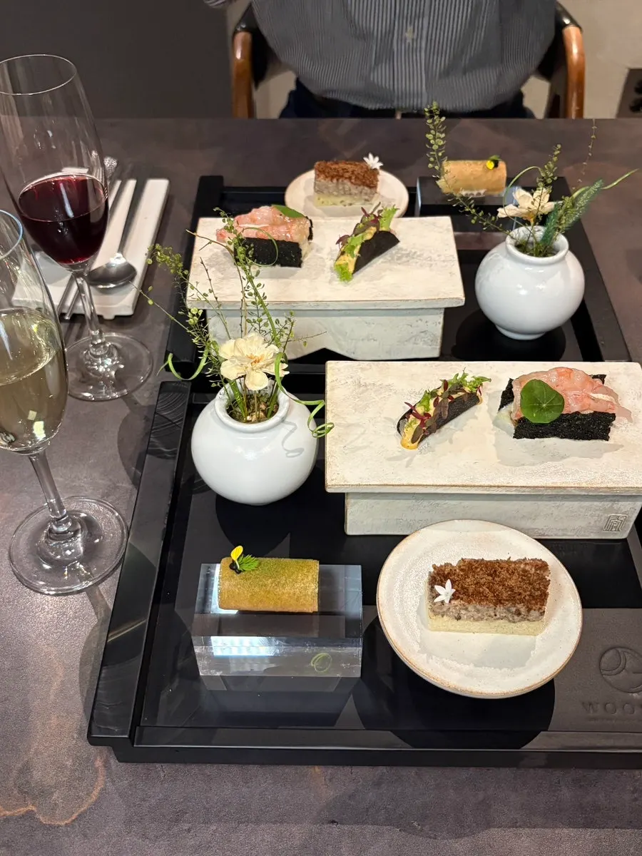 Plate with four bite-sized dishes