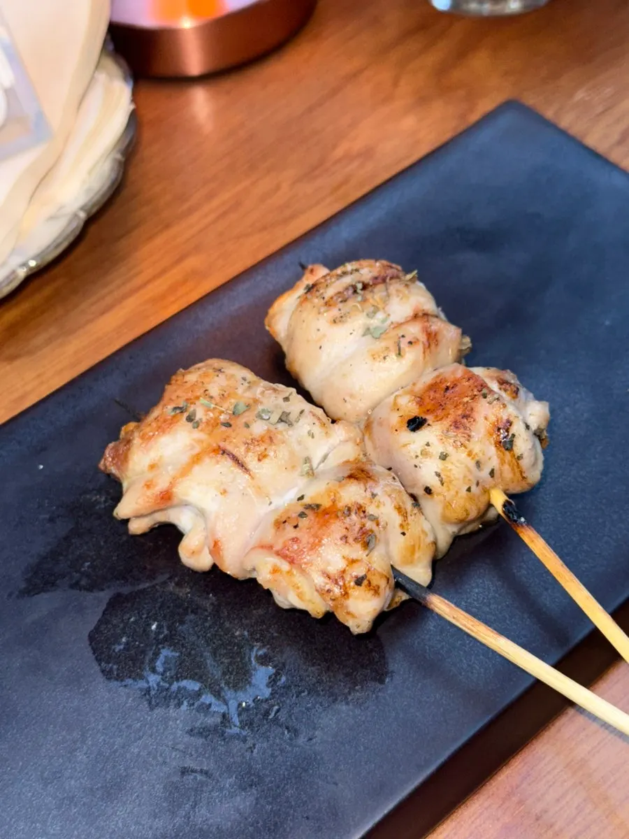 Close-up of the truffle chicken thigh skewer