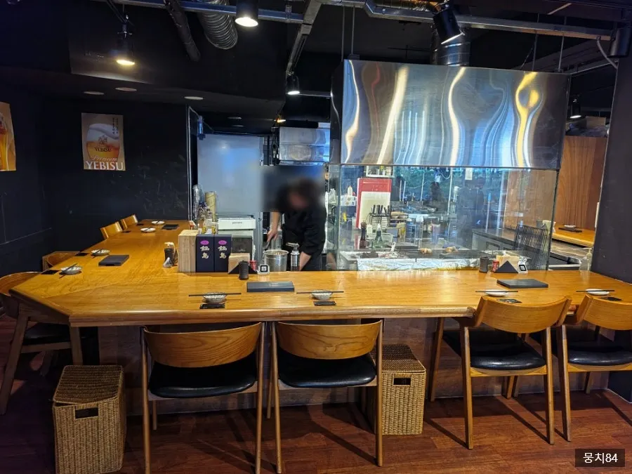 Atmospheric bar table seating at Yakitori Shomong