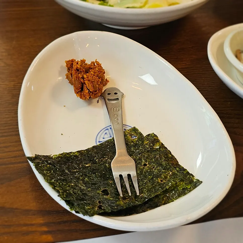 Assortment of seasoned green side dishes
