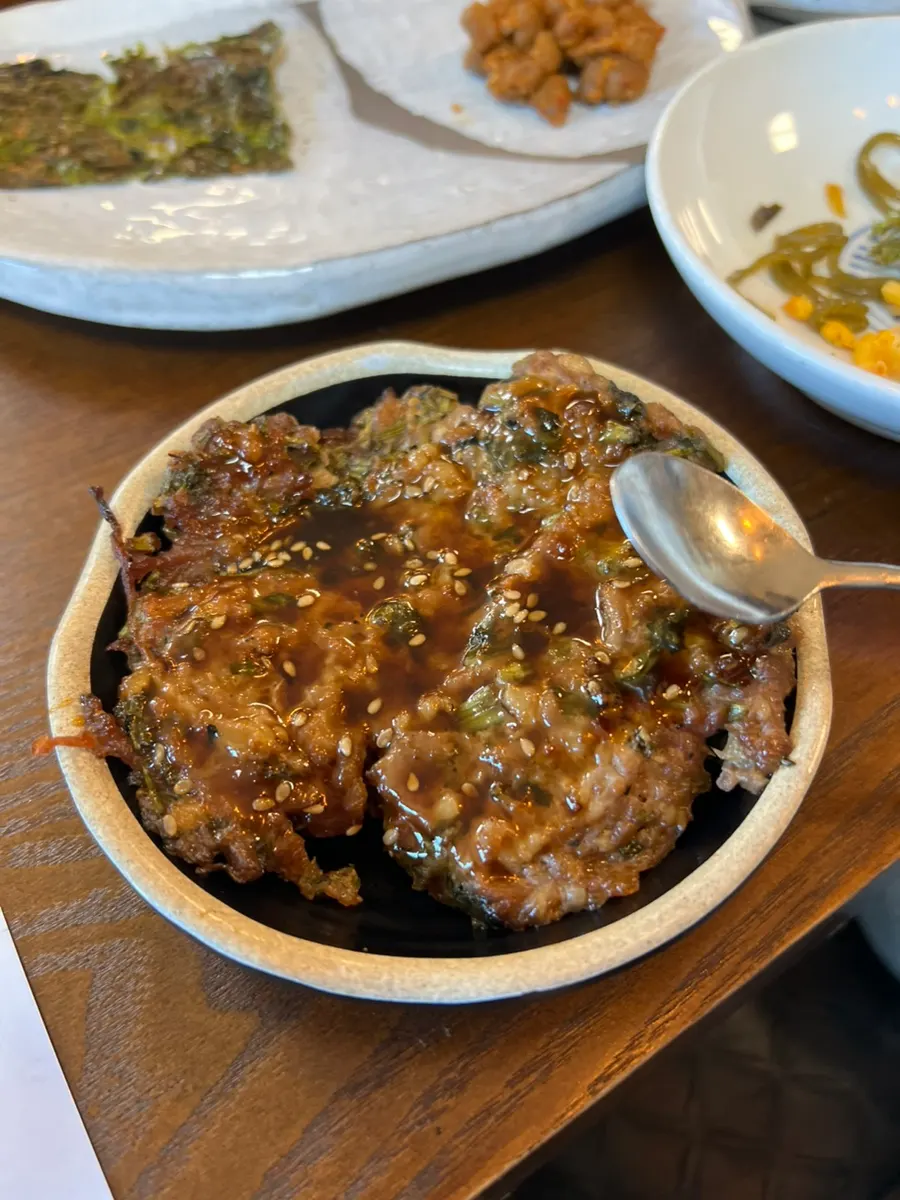 Close-up of handmade tteokgalbi with minari