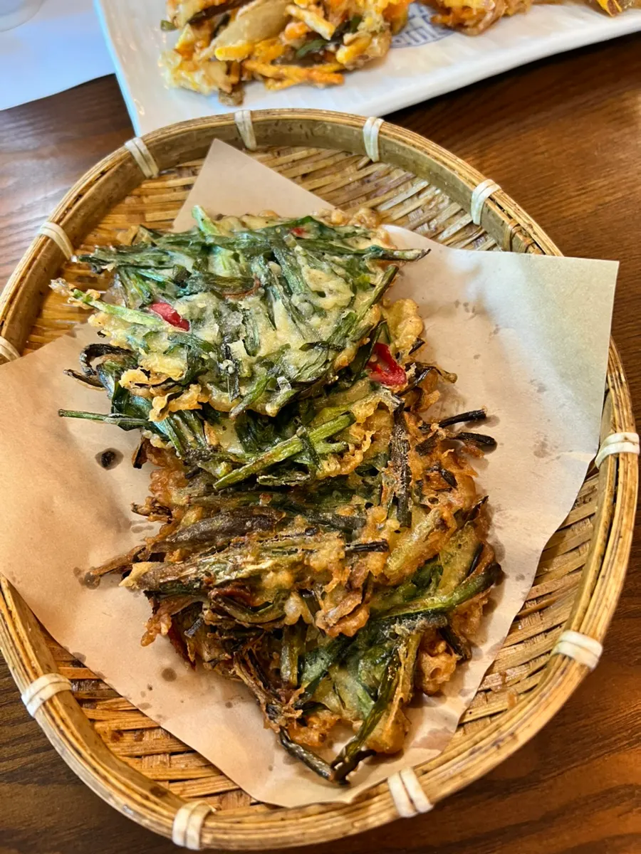 A spread of namul and side dishes