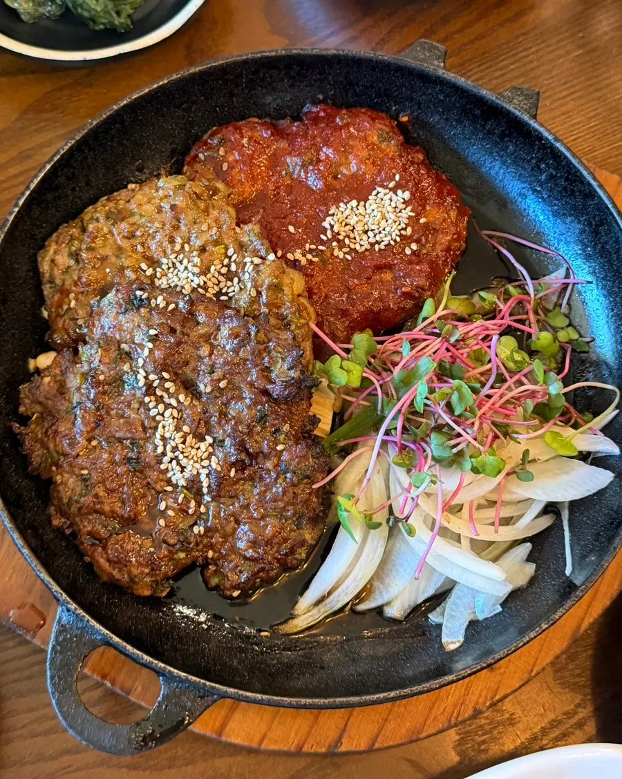 A spread with lettuce wraps and gangdoenjang