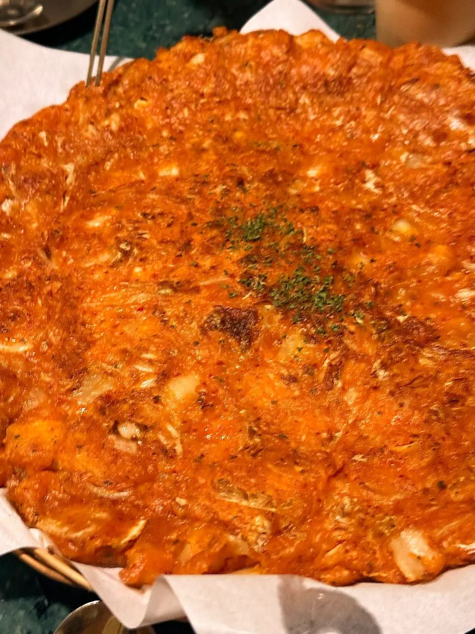 A full plate of Gongjung Dodeok's kimchi pancake