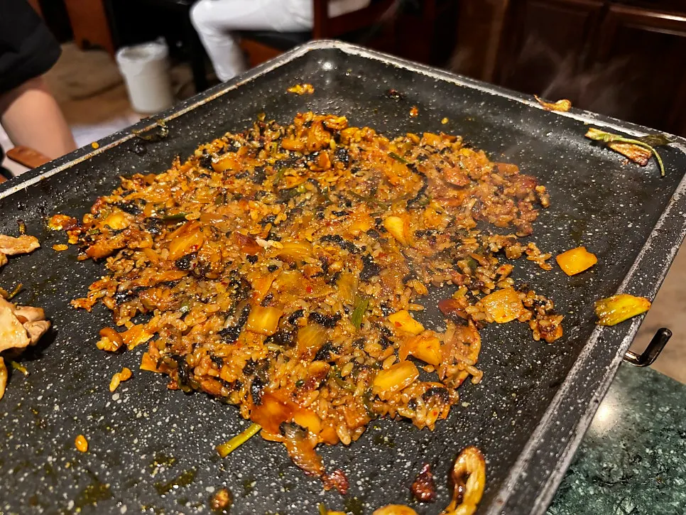 Kimchi fried rice being cooked directly on the grill