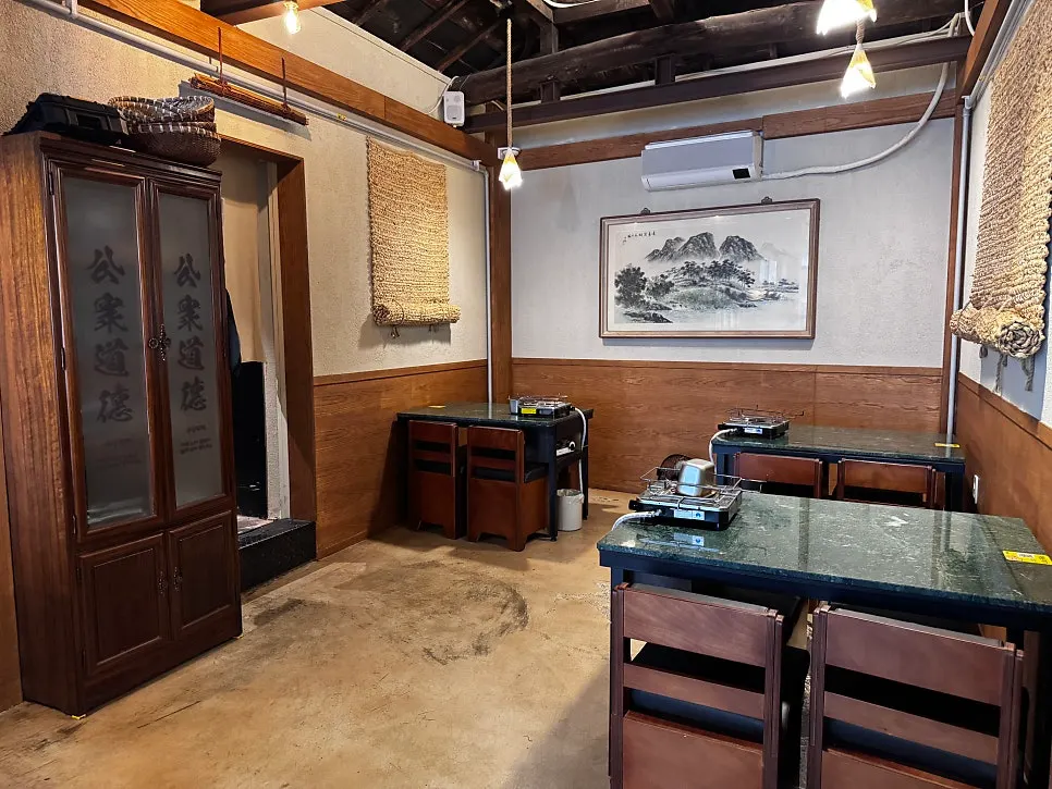 Interior of Gongjung Dodeok decorated with dark wood