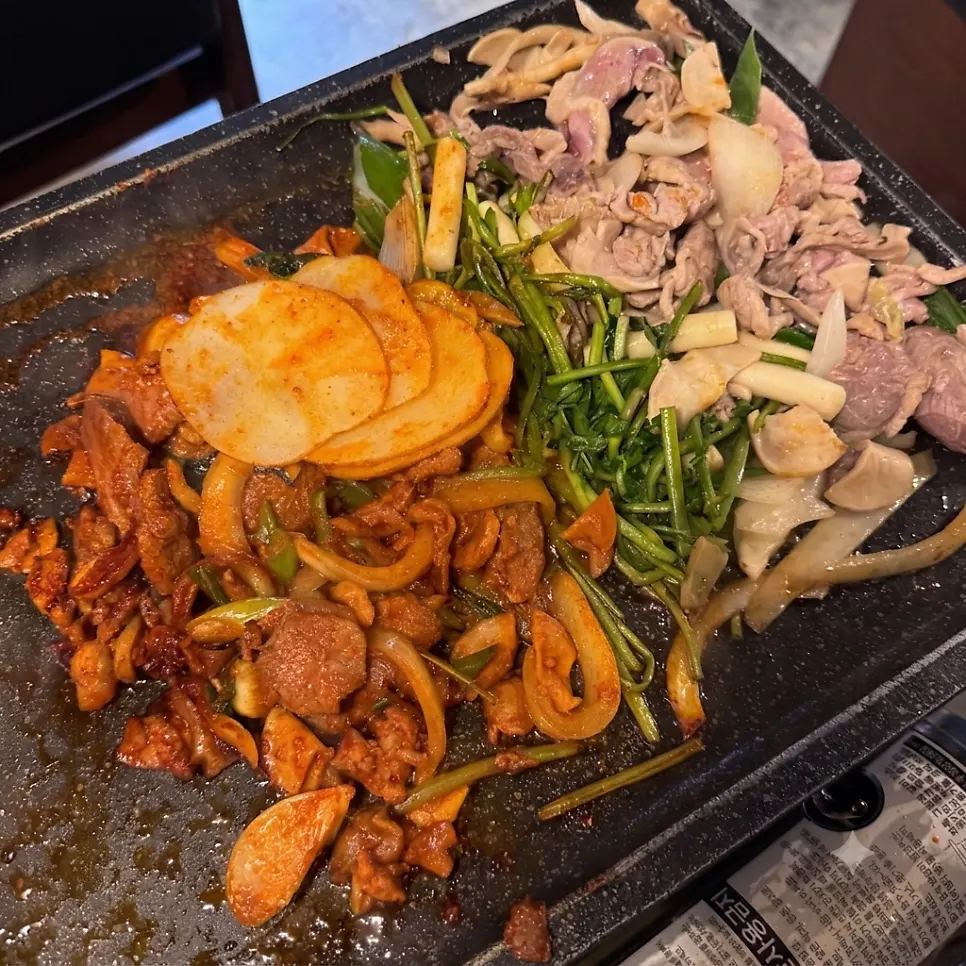 Duck bulgalbi and minari grilling on the grill