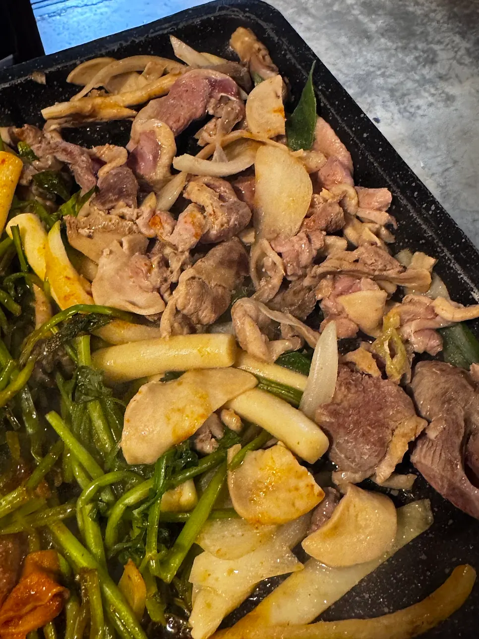 Close-up of Gongjung Dodeok's roasted duck cooking