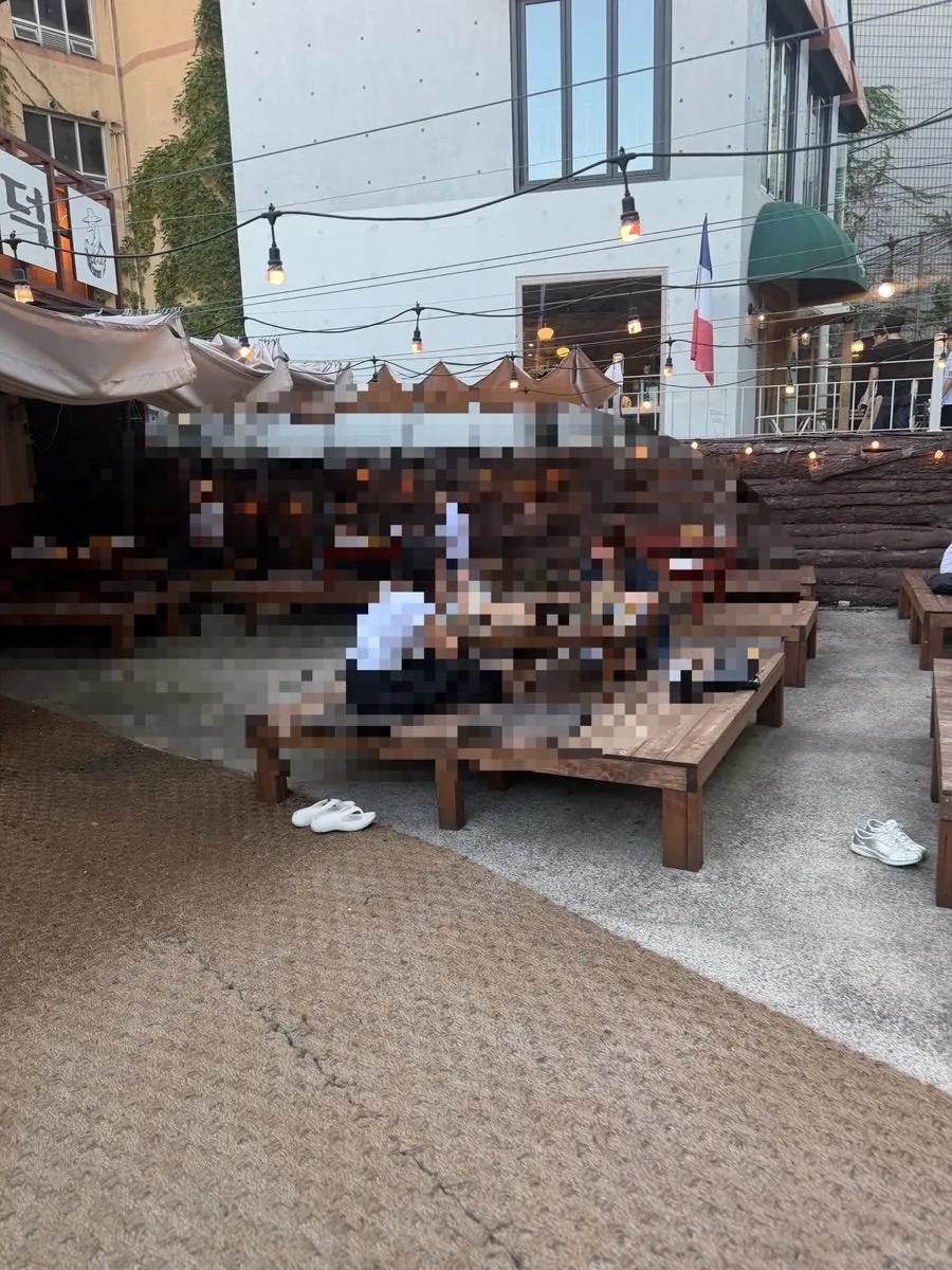Outdoor bench seating at Gongjung Dodeok