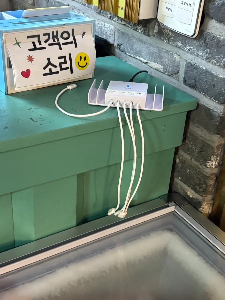 Interior of the restaurant with meat origin labels posted