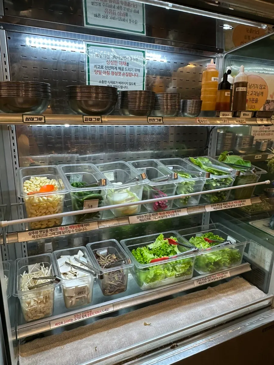 Self-serve meat bar displaying 8 kinds of pork