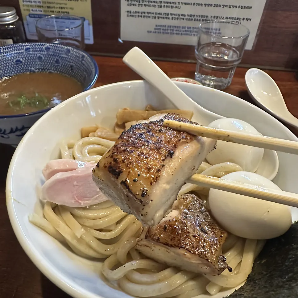 Chicken topping eaten with tsukemen