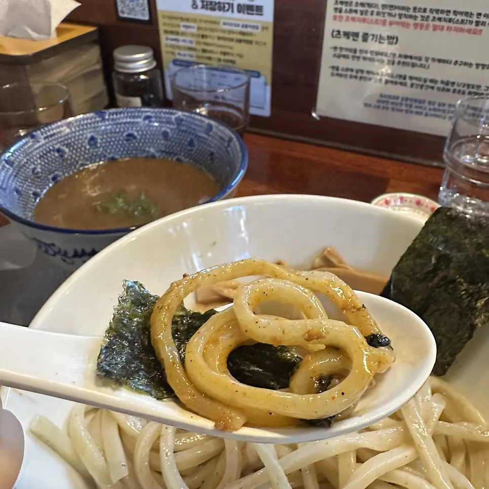 Chicken topping eaten with tsukemen