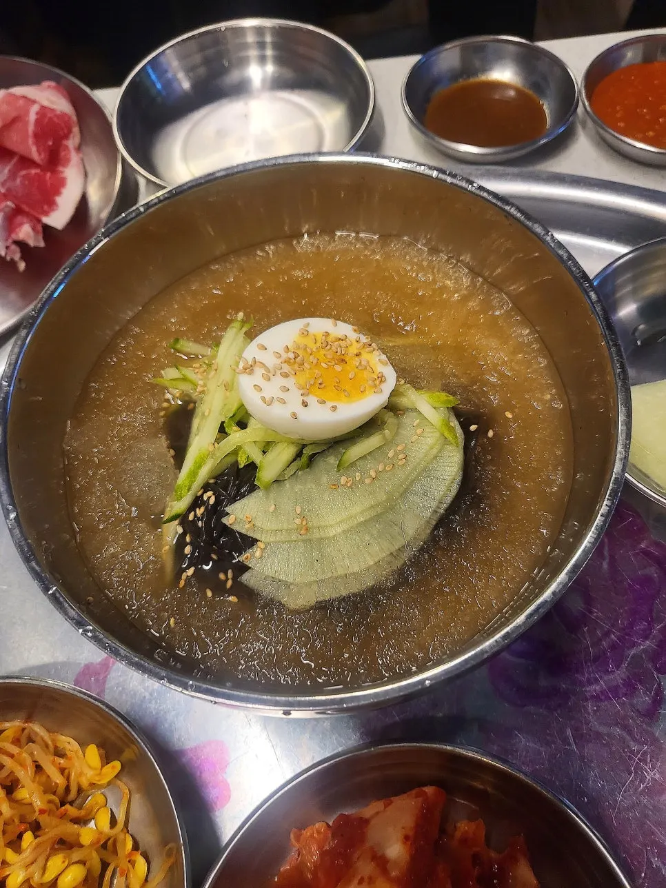 Refreshing mul-naengmyeon served with meat