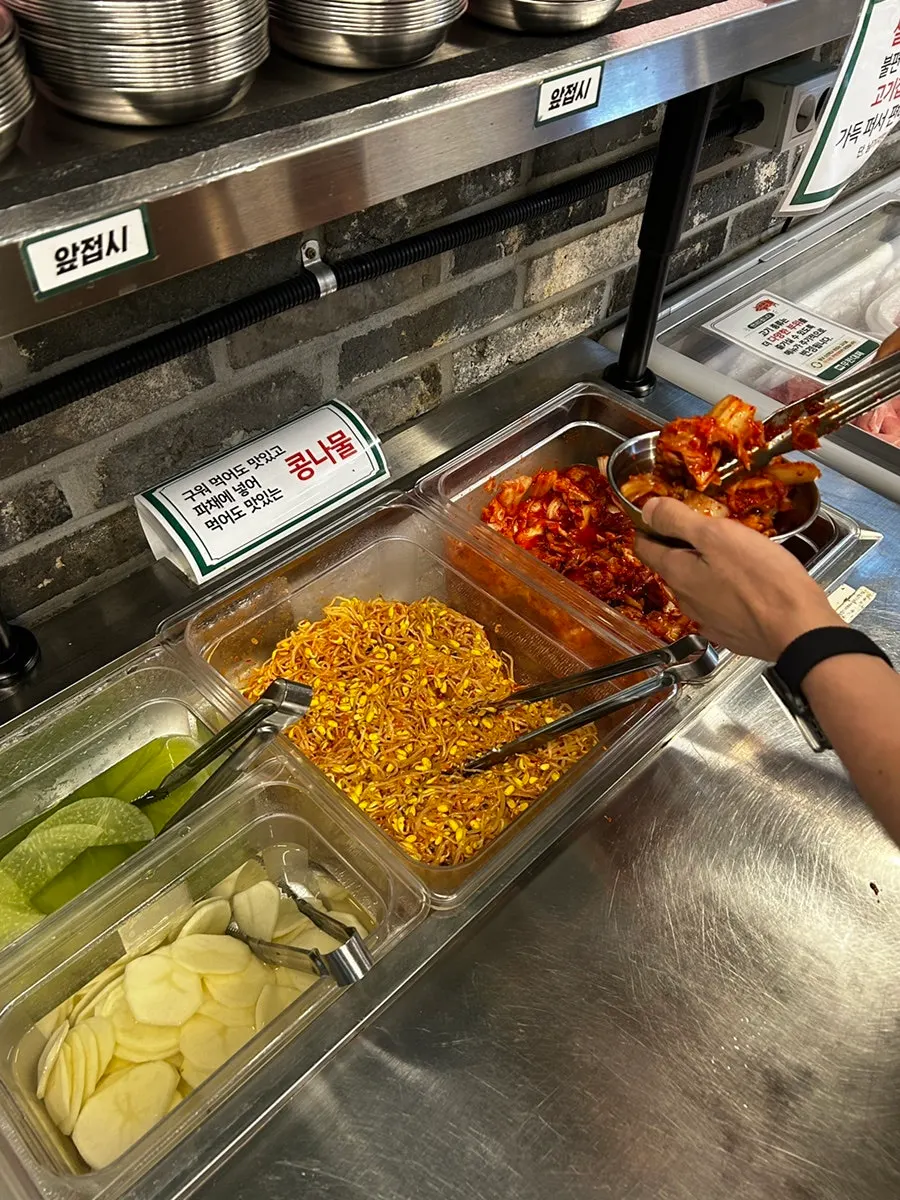 Thin-cut pork belly displayed at the self-serve bar