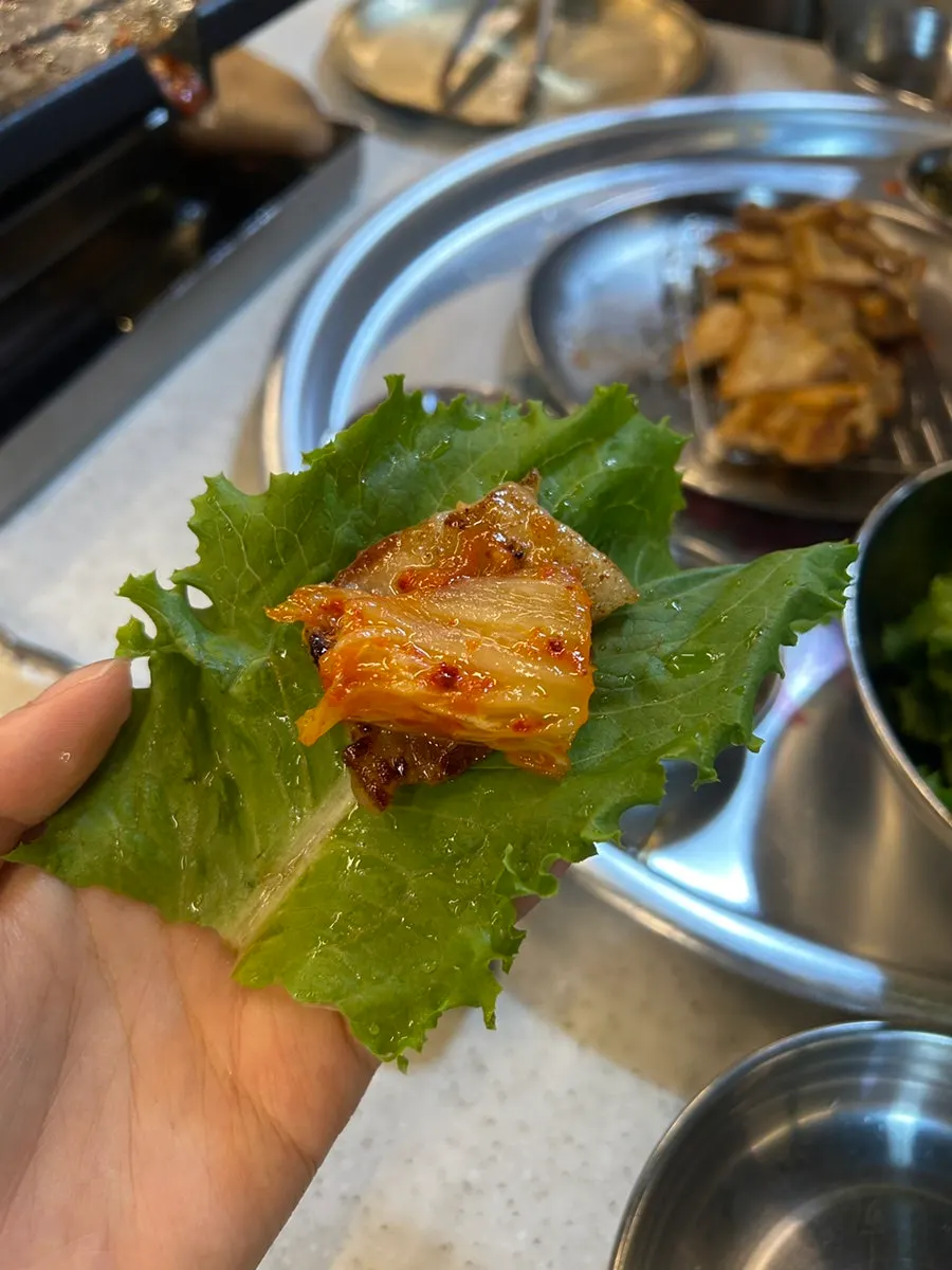 Grilled pork belly plated with sauce
