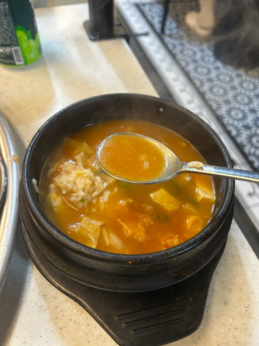 A bowl of doenjang sulbap with thick, hearty broth